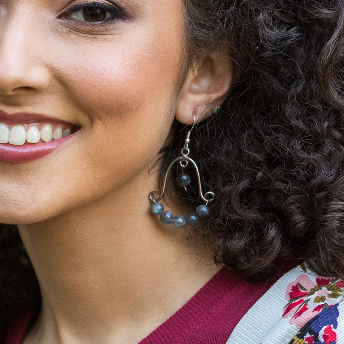 a woman wearing a Wire-Wrapped Stone Earrings- Antique Silver, Labradorite