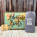 Life is better at the lake items in an assorted layout with wooden background