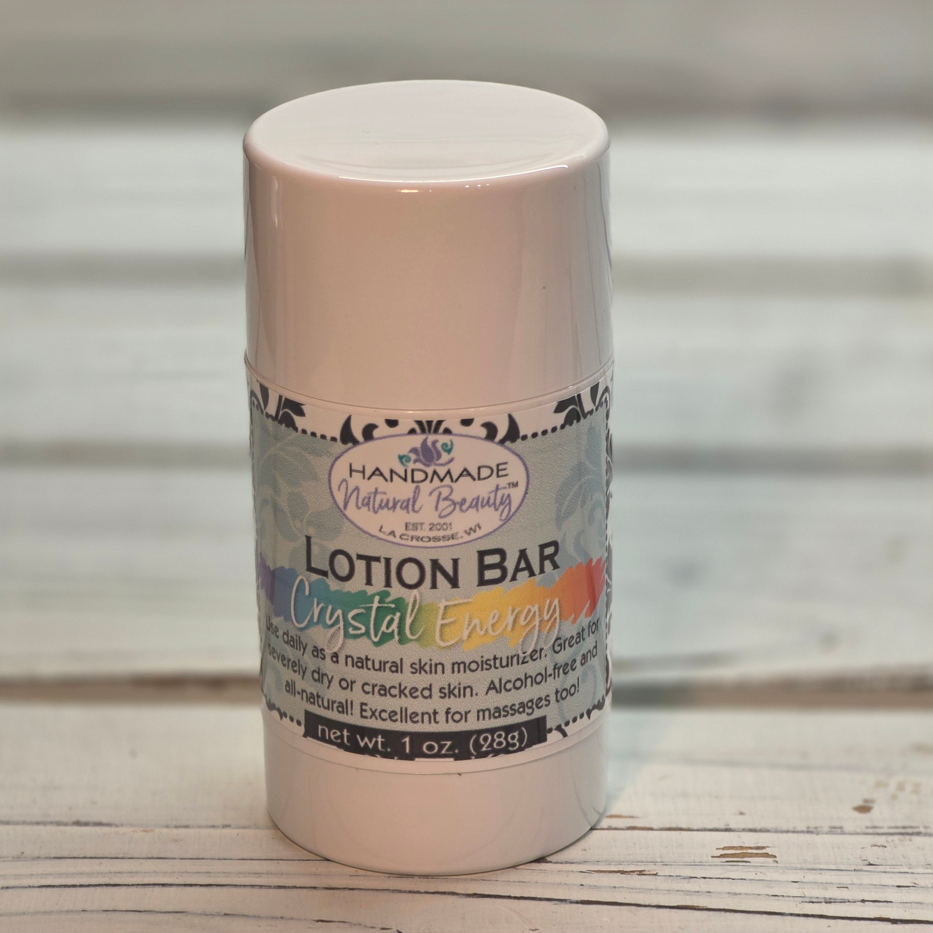 Lotion bar in a cylindrical container with a label on a wooden surface