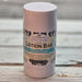 Lotion bar with a decorative label on a wooden surface scented Shoreline.
