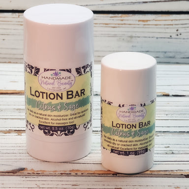 Two lotion bars labeled 'Handmade Natural Beauty' on a wooden surface