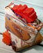 Orange purple and white swirled goat milk soap by Handmade Natural Beauty featuring various shapes of autumn leaves glycerin soaps on top.